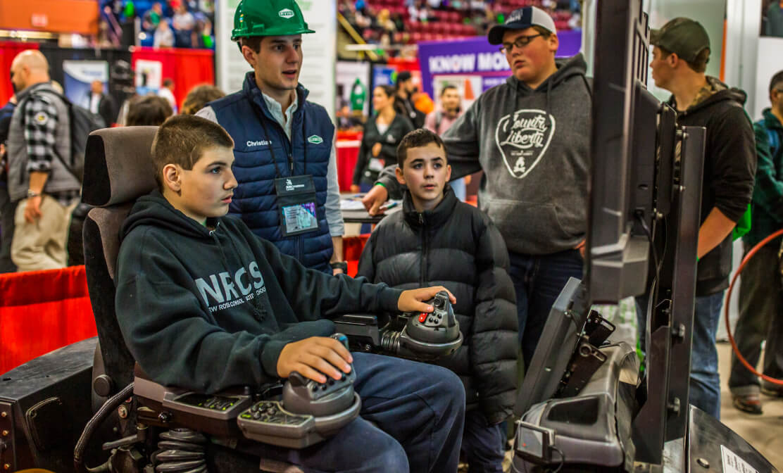 Teenagers at an iteractive tech event